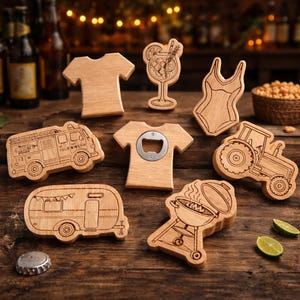 May include: A collection of wooden bottle openers and decorative items, including a fire truck, trailer, tractor, t-shirt, swimsuit, cocktail, and grill. The items are made of light-colored wood and are arranged on a wooden surface.