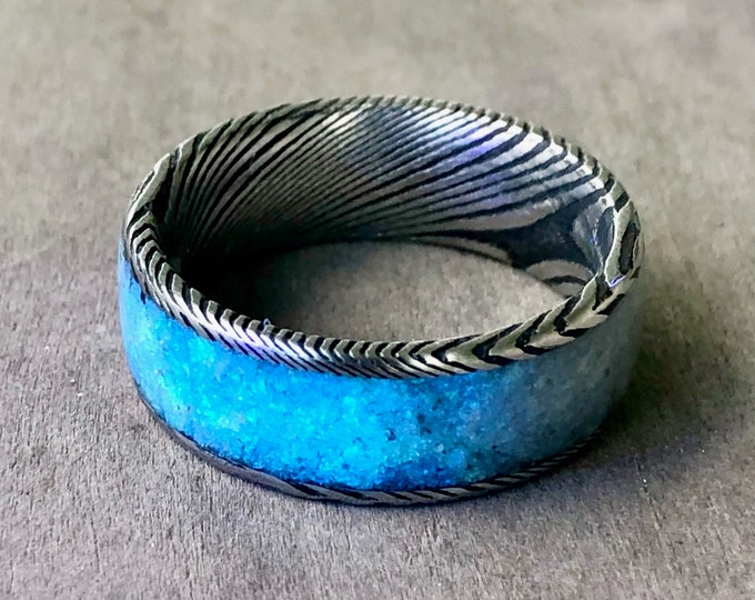 Handmade "glow stone" inlay ring in Damascus steel. Sizes 5 to 17 (to order), 8mm width.