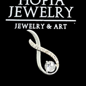 Eternal Elegance: Sterling Silver Infinity Pendant with Topaz Stone - A Timeless Symbol of Love