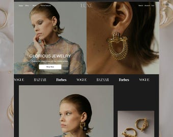 May include: A website interface displaying jewelry products, featuring a gold textured hoop earring with a cage-like design, and a pair of gold hoop earrings with a textured bar detail. The page includes the text LUXE, GLORIOUS JEWELRY, and Shop Now.