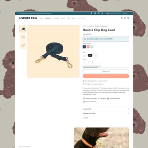 May include: A dark blue double clip dog lead with gold-toned metal hardware displayed on an e-commerce product page for Inspired Paw. The page features the product title Double Clip Dog Lead, color selection options, and size selection buttons.