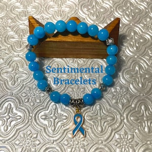 Light Blue Awareness Bracelet with Ribbon Charm, Jade Gemstone Bracelet, Serenity Bracelet, Purity Bracelet, Tranquility Bracelet
