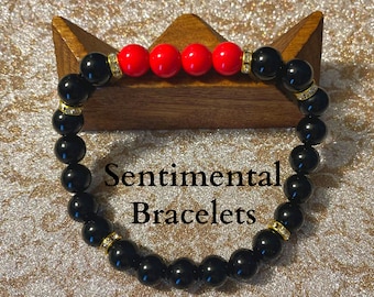 Black Onyx Gemstone Bracelet with Red Accent Beads