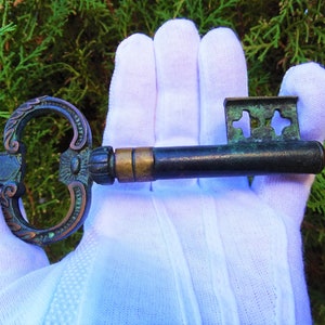 Vintage messing kurkentrekker flesopener: verzamelobject patinadecor