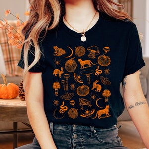 Witchy shirt, pumpkins, spiders & cat vintage tee woman, orange graphic tee, pagan witch gift, black unisex tshirt, over-sized tee Black