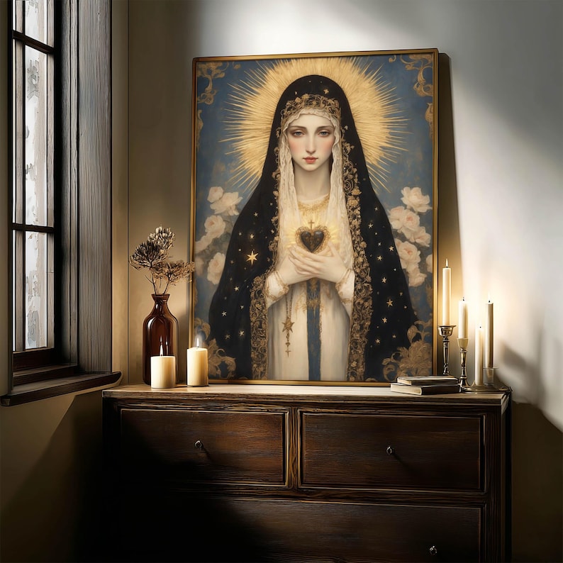May include: A framed portrait of a woman with a halo, wearing a black veil with gold stars and a white dress. The portrait is on a wooden dresser with candles and a vase of dried flowers. The background is a soft blue with white flowers.