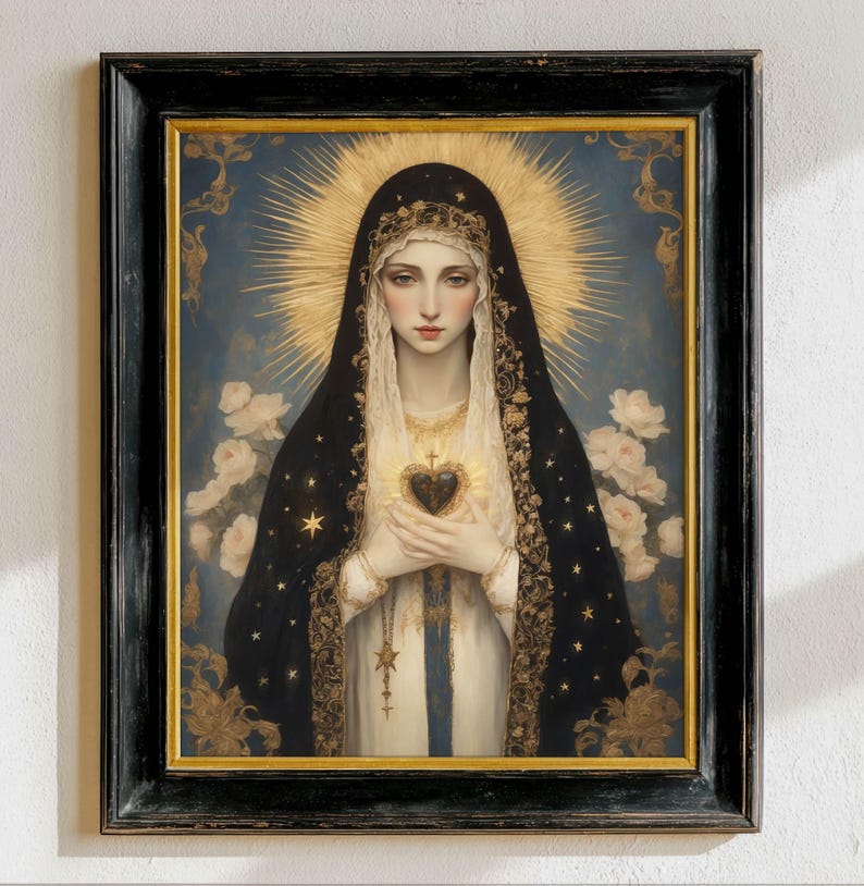 May include: A framed portrait of a woman with a halo, wearing a black veil adorned with gold stars. She holds a heart-shaped object. The background is blue with white roses and gold accents. The frame is black.
