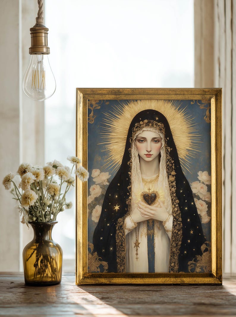 May include: A framed religious portrait depicts a woman in a black veil and gold halo, holding a heart. The artwork is set against a blue background with a gold frame. A vase of white flowers and a light bulb are in the foreground.
