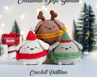 May include: Three crocheted dog figures in festive outfits. One is brown with antlers and a yellow scarf, and two are white with red and green details. The image includes the text "Christmas Dogs Bundle" and "Crochet Pattern".