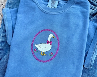 Embroidered goose in a frame, antique trendy goose duck, flower, coquette bow, framed good, thrifting, thift antique embroidery, trending