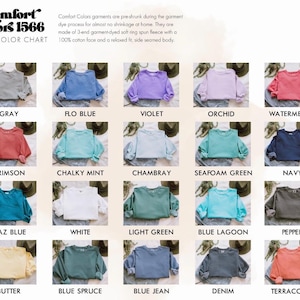 May include: A Comfort Colors 1566 color chart displaying twenty crewneck sweatshirts in various shades including gray, blue, violet, orchid, watermelon, crimson, mint, chambray, green, navy, white, pepper, butter, spruce, and terracotta.