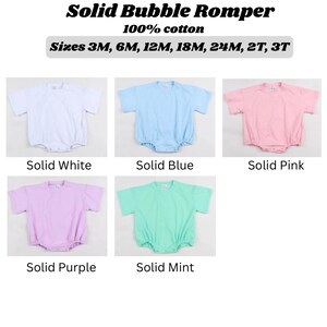 May include: A collection of solid-colored bubble rompers in white, blue, pink, purple, and mint. The image displays the text "Solid Bubble Romper" and "100% cotton." Sizes available are 3M, 6M, 12M, 18M, 24M, 2T, and 3T.