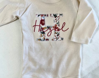 Floral applique inital -  name onesie - baby gown - newborn - baby outfit - coming home outfit - applique - embroidered name onesie - baby