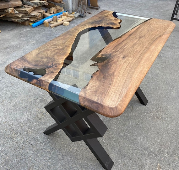 epoxy resin table. Walnut and transparent resin table.