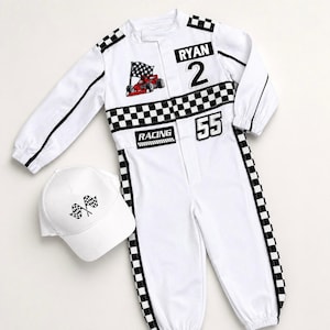 May include: A white racing jumpsuit with long sleeves, elastic cuffs, and a black and white checkered pattern along the sides and chest. It features the text RYAN, RACING, and the numbers 2 and 55, plus a red race car graphic. A matching white baseball cap with two crossed checkered flags is included.
