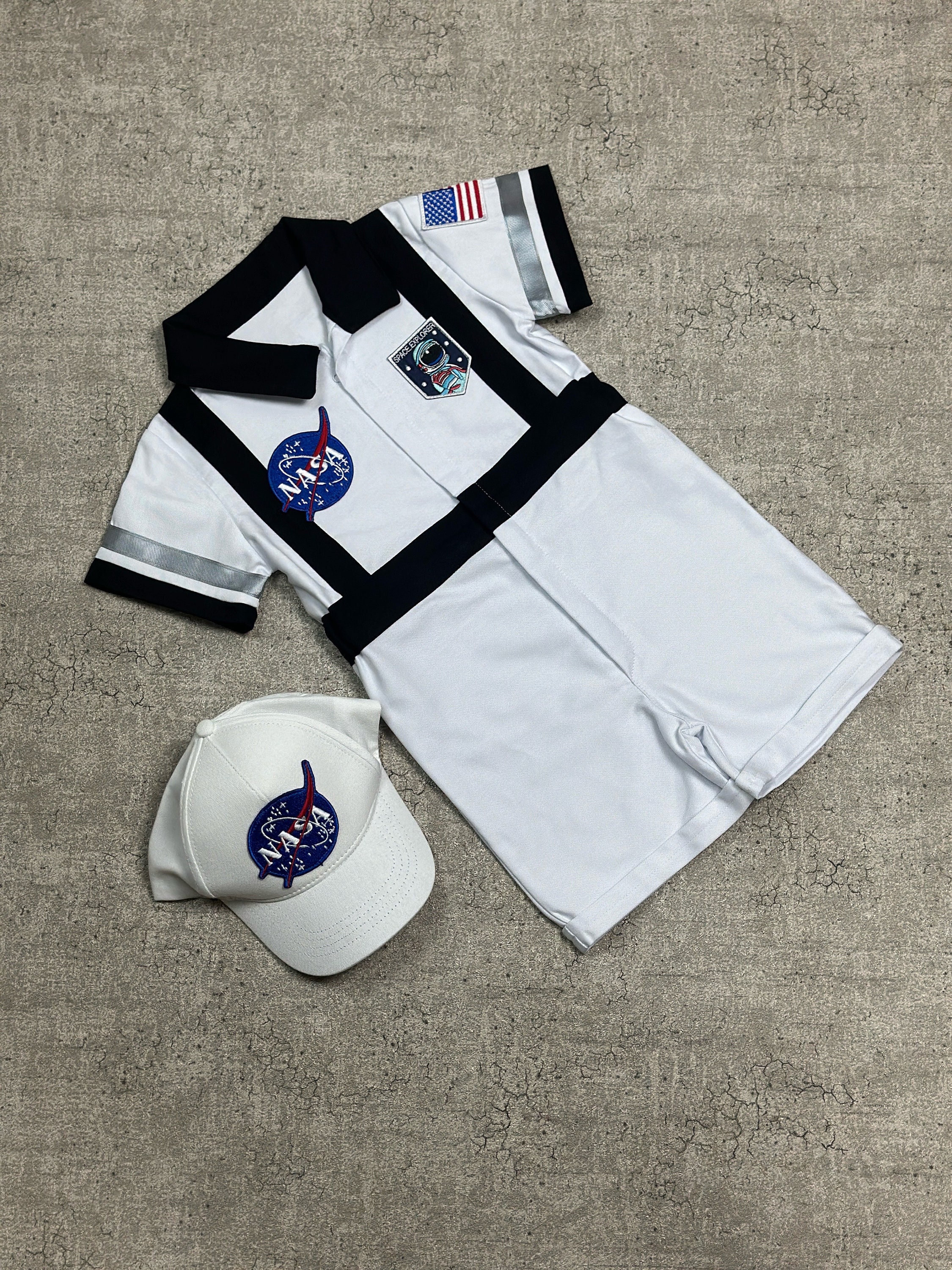 Organic Cotton Printed Hat & Bib Set Black Astro Dinosaur Organic Cotton Printed Hat & Bib Set Black Astro Dinosaur