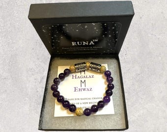 May include: A purple amethyst bracelet with silver rune charms and a card that reads "Hagalaz M Ehwaz Ready for radical change End of a new begin The path di"