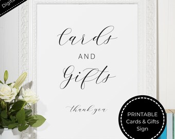 May include: Printable sign with the text "cards and gifts thank you" in a white frame. The sign is for a wedding or other event where guests can leave cards and gifts.