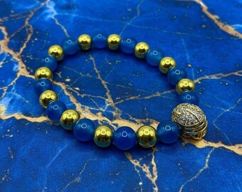 Pulsera de fútbol americano de la UCLA: Ágata azul, dije de casco dorado, regalo de joyería deportiva universitaria