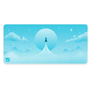May include: A blue and white illustrated design of a rocket launching into the sky with a large moon and stars in the background. The design is on a blue desk mat with the letters "TS" in the bottom left corner.