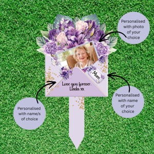 May include: A commemorative garden stake featuring a light purple envelope design adorned with purple floral illustrations. The envelope displays a photograph of an elderly person, the text "Love you forever. Linda xx," and a tag labeled "Mum."