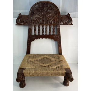 Vtg. Wooden Tribal Pidha Low Chair Weaved Bottom Carved Frame Floral Elephants