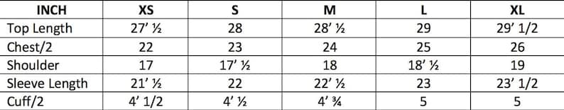 May include: Size chart for a garment with measurements in inches for top length, chest, shoulder, sleeve length, and cuff. Sizes include XS, S, M, L, and XL.