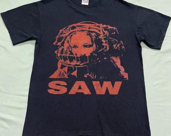 Vintage Saw Horror Movie T-Shirt, manda Young Saw Vintage T-Shirt, Saw Horror Movie Gift For Women and Man Unisex T-Shirt