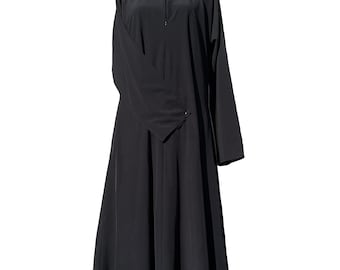 May include: A black abaya with a zipper closure and long sleeves.