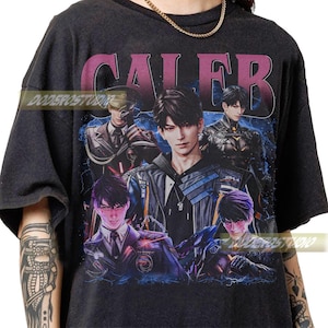 May include: Dark gray t-shirt featuring a graphic of several anime-style characters with the name "CALEB" in a purple font across the top. The design includes a variety of poses and outfits, with a blue and purple color scheme.
