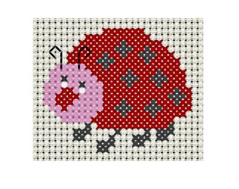 May include: A cross-stitch pattern of a ladybug with a pink head and red body with black spots.