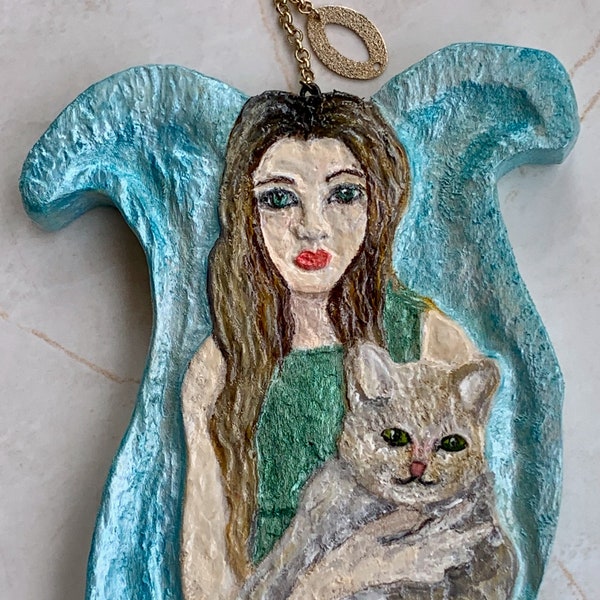 Cat mom, angel ornament. Carved, wooden angel holding chubby cat. Handmade. Perfect for hanging year round. 7 1/4 " tall by 5" wide.
