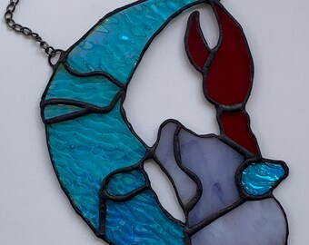 Moon Tarot, Sun Catcher, Iridescent stained glass, 6 inches tall, 5 1/4 inches wide.