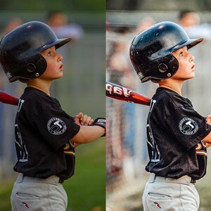 May include: A young baseball player wearing a black jersey with a white logo and a black helmet with a white stripe. The player is holding a red and black baseball bat and is looking off to the side.