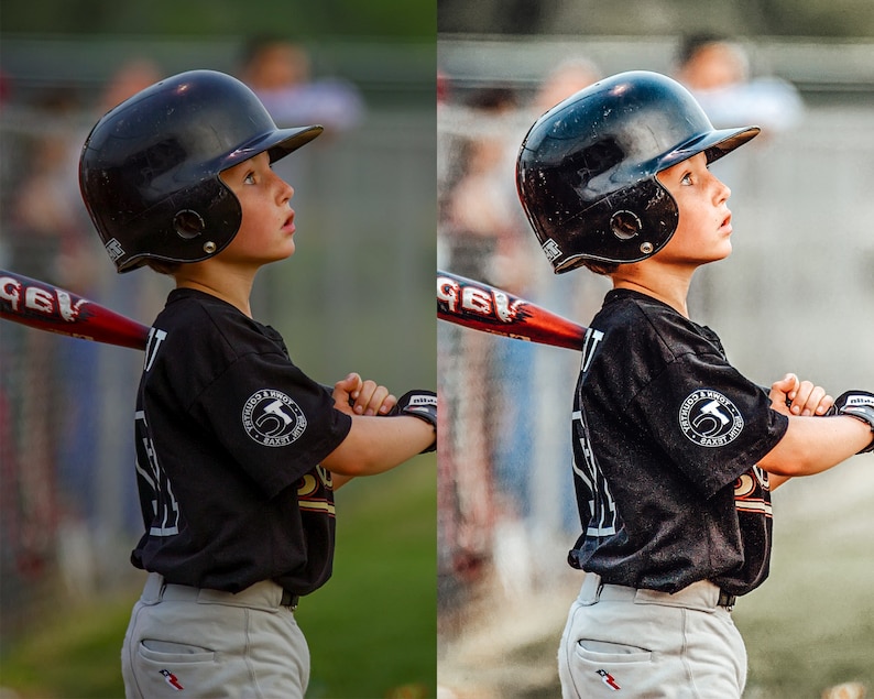 May include: A young baseball player wearing a black jersey with a white logo and a black helmet with a white stripe. The player is holding a red and black baseball bat and is looking off to the side.