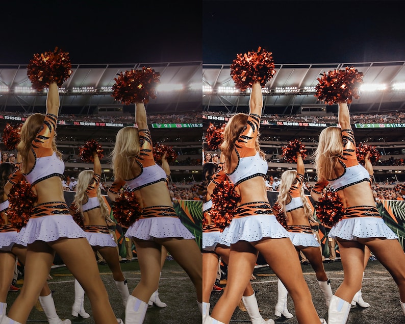 May include: A group of cheerleaders wearing white and orange uniforms with tiger stripes, holding orange pom-poms, perform a routine in front of a stadium at night.