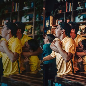 May include: Four people wearing yellow and green soccer jerseys are cheering. They are standing in a bar with a wooden counter and shelves behind them.