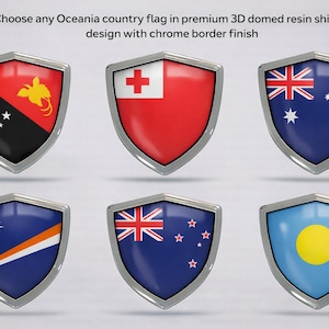 Op de afbeelding: Schildvormige emblemen met vlaggen van landen in Oceanië, met een chromen rand en een gewelfde harsafwerking. Vlaggen zijn onder meer Papoea-Nieuw-Guinea, Tonga, Australië, Marshalleilanden, Nieuw-Zeeland en Palau. De tekst luidt: "Kies een vlag van een land in Oceanië..."