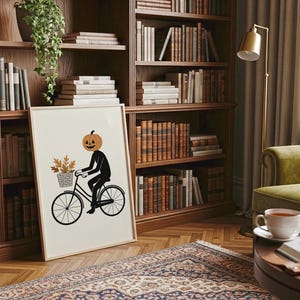 Pumpkin Head Bicycle Print – Halloween-muurkunst, herfstpompoendecor, spookachtige minimalistische poster