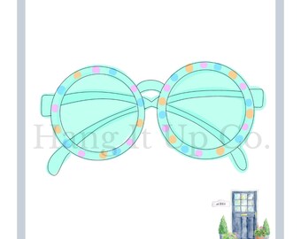 May include: Round, light blue sunglasses with a colorful polka dot pattern. The sunglasses have a thin black frame.