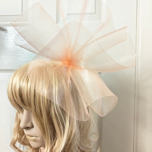 peach nude crin fascinator wedding hat on headband ( can change into clips or comb if requested on checkout)