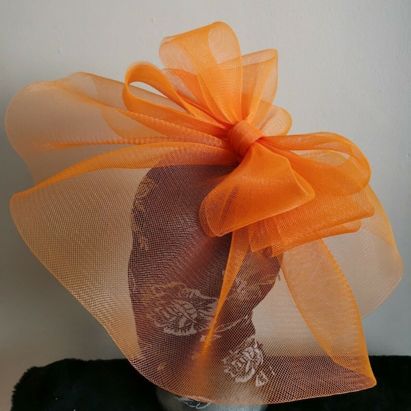 orange crin fascinator wedding hat on headband ( can change into clips or comb)