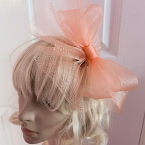 Peach crin fascinator wedding hat on headband ( can change into clips or comb)