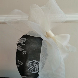 ivory cream crin fascinator wedding hat on headband ( can change into clips or comb)