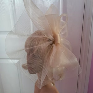 ivory cream crin fascinator wedding hat on headband ( can change into clips or comb)