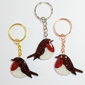 Handmade glitter Robin resin keyring.