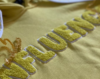 Pop in the mall on a beautiful Saturday with this mellow yellow crop.