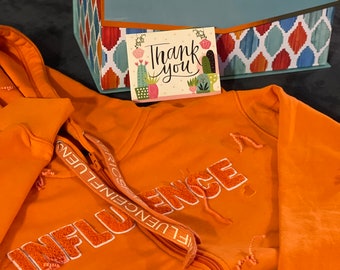 Orange hooded zip up sweatshirt