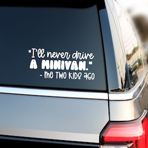 May include: A silver minivan with a white vinyl sticker on the back window that reads "I'll never drive a minivan." - me two kids ago