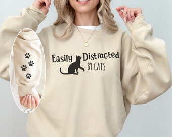 Easily Distracted by Cats Sweatshirt with Paw Design on Sleeve